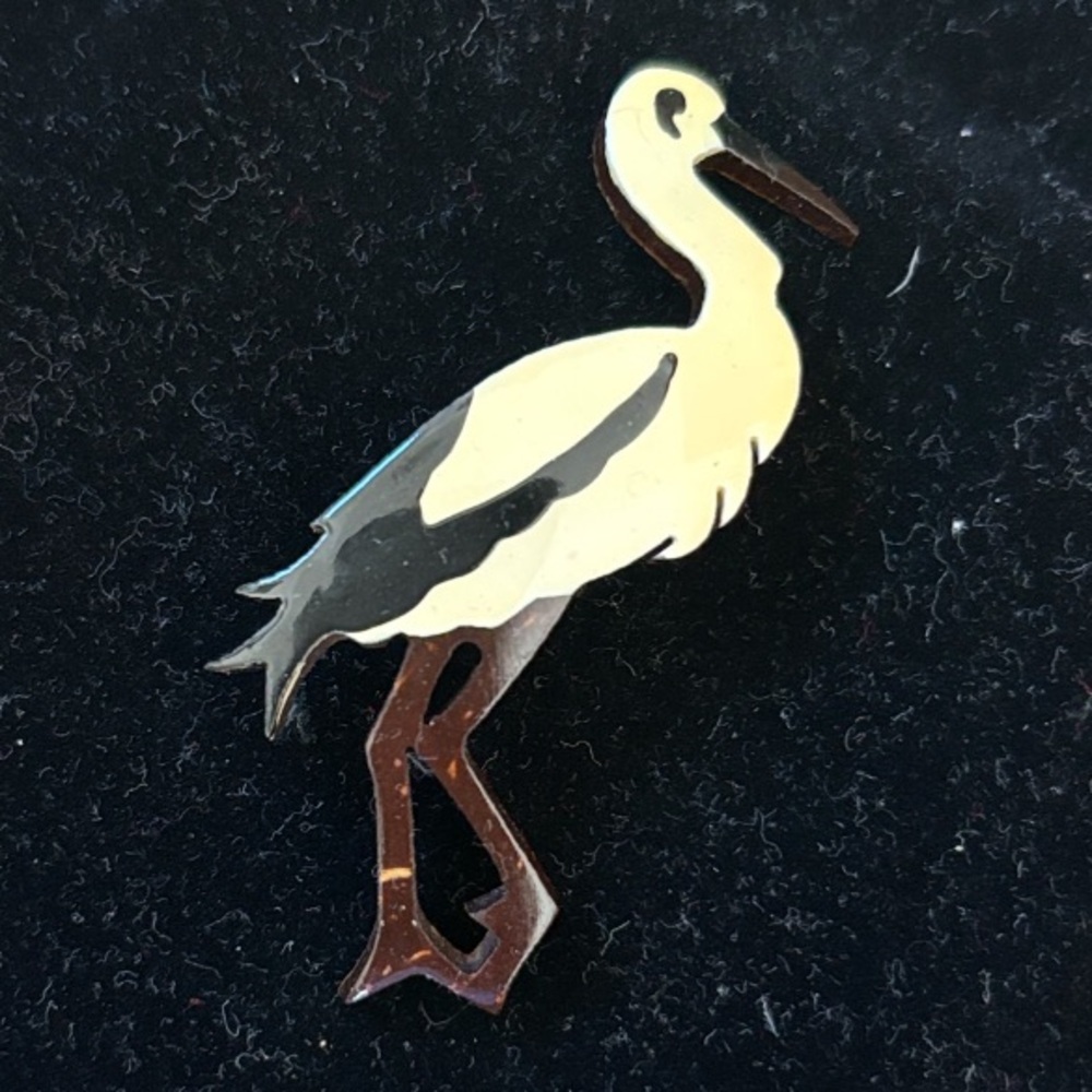 Elegant Black and White Wooden Bird Pin